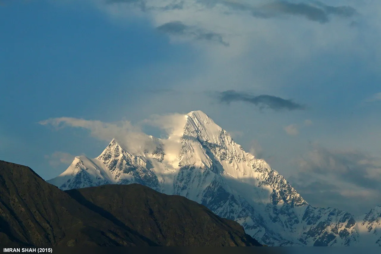 Bilchar Dobani, the 6,138 metre peak above Bagrote Valley known as the Queen of Gilgit, lit by evening sun, Gilgit-Baltistan, Pakistan