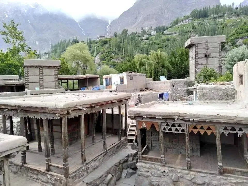 Traditional carved wooden houses and verandas in the old settlement of Ganish, the oldest village in Hunza, Gilgit-Baltistan