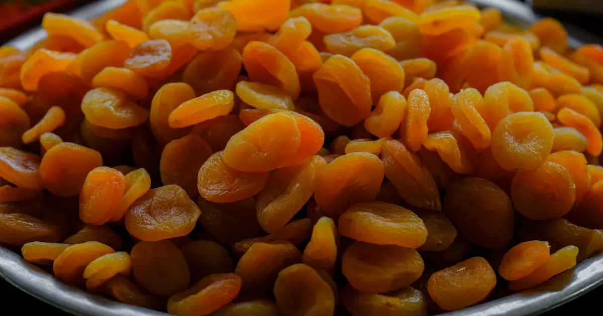 A plate of sun-dried Hunza apricots at a market in Karimabad, a staple of the traditional Hunza diet, Gilgit-Baltistan