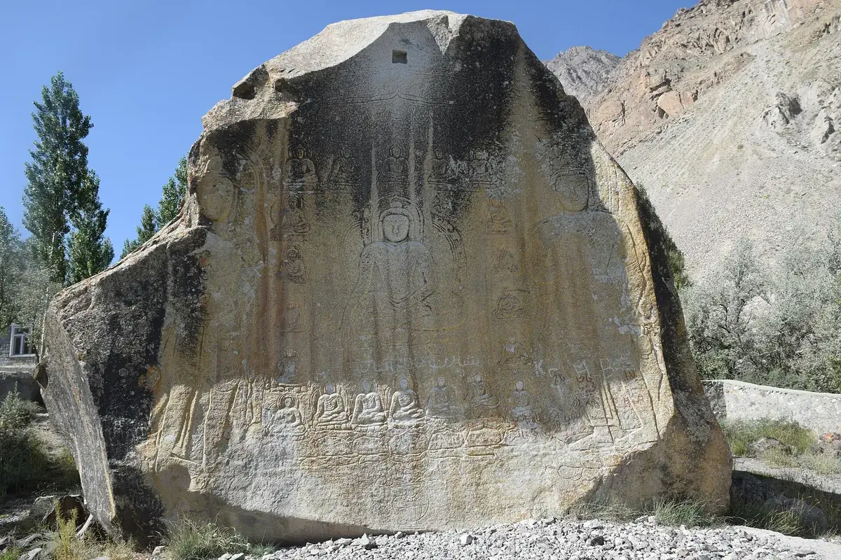 The Manthal Buddha Rock on the edge of Skardu, a large granite boulder carved with Buddhist figures and inscriptions
