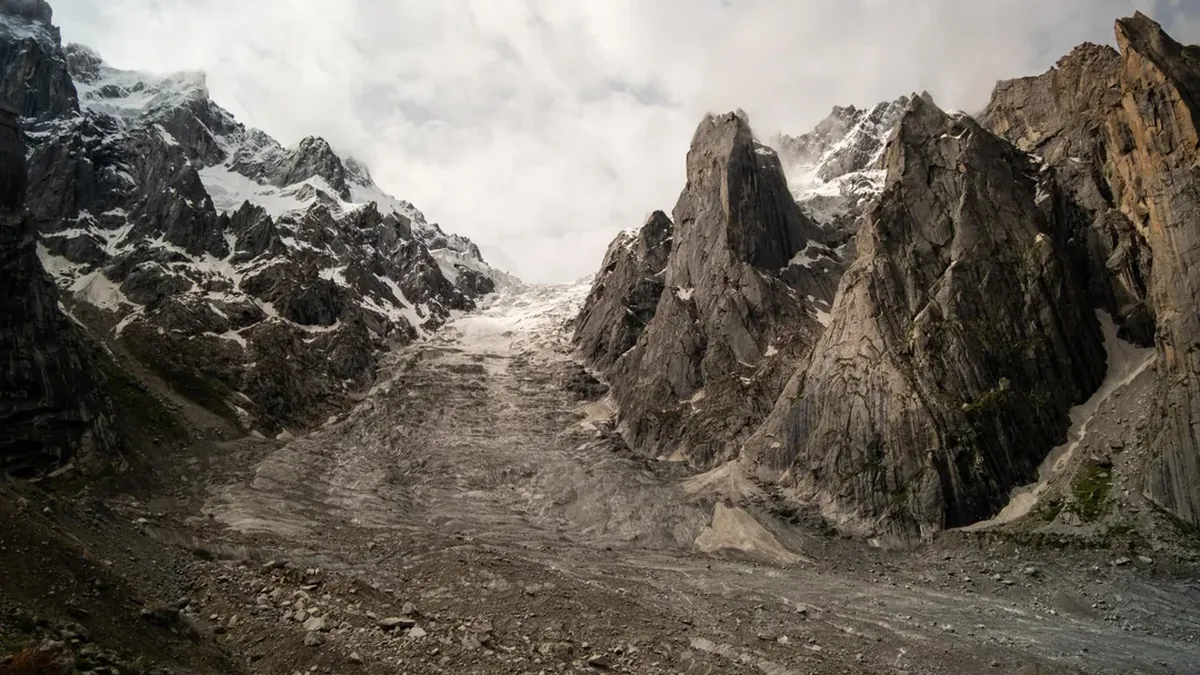Glacier and moraine filling the upper Nangma Valley between granite walls, Ghanche district, Baltistan