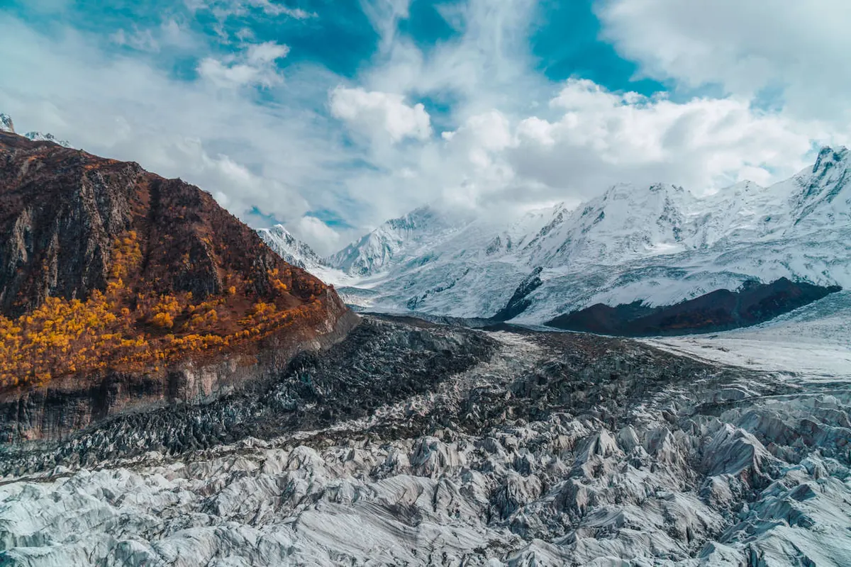 The Minapin Glacier below the snow-covered peaks of Rakaposhi and Diran, seen from the Rakaposhi Base Camp trek