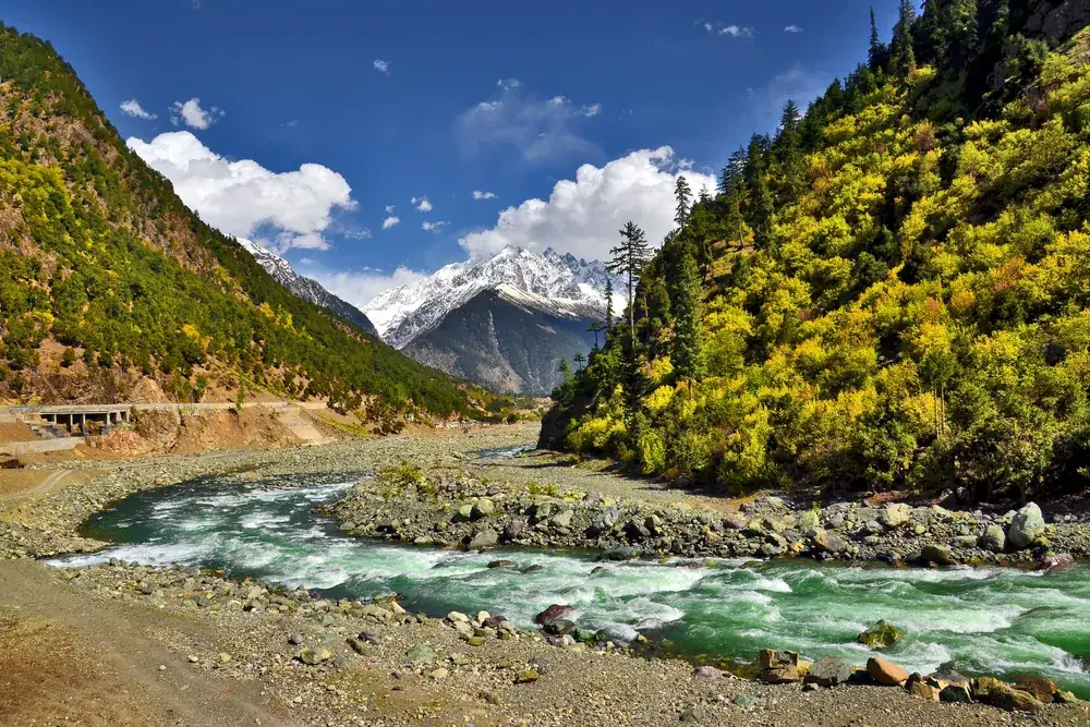 The green Swat Valley near Kalam with the Swat River and forested slopes, Khyber Pakhtunkhwa, Pakistan