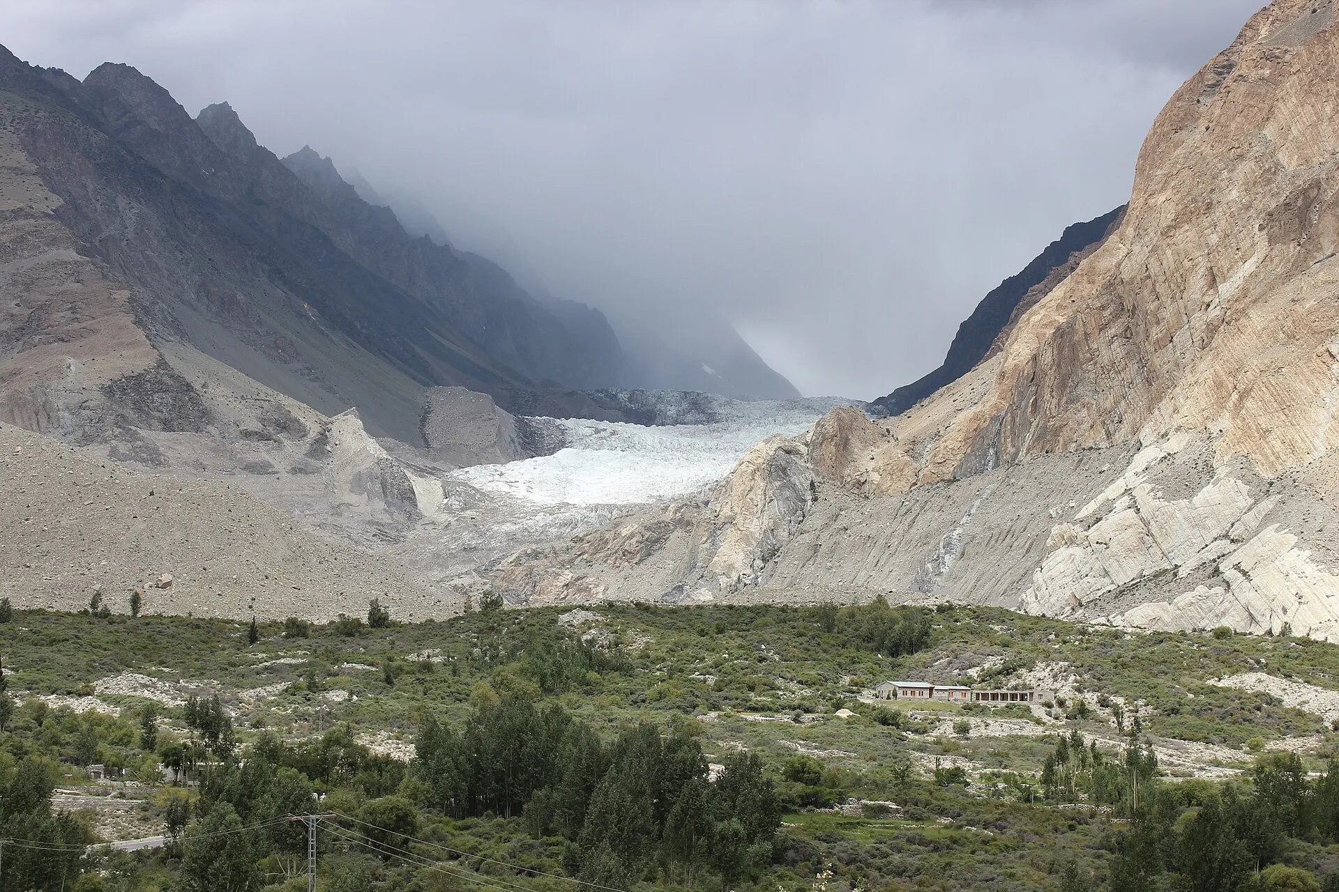 The moraine of the Batura Glacier below snow-capped peaks
