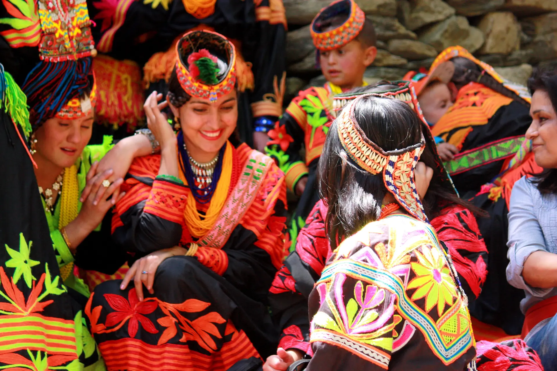 Festival crowd gathered at a Kalash dancing ground in the Bumburet valley