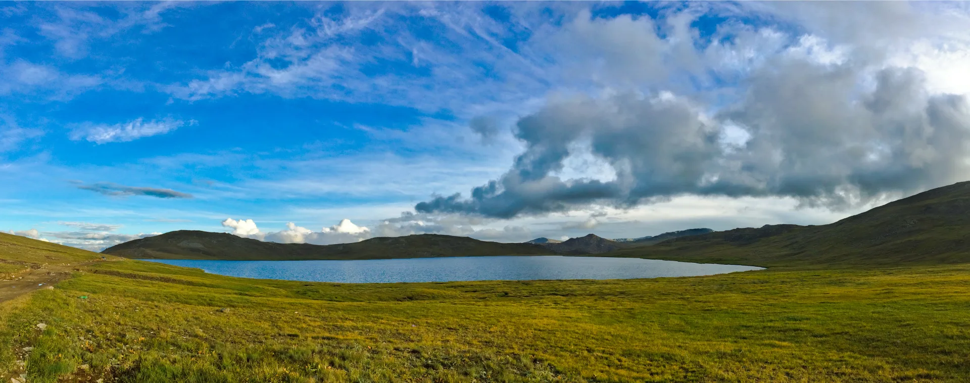 Sheosar Lake among the green Deosai Plains