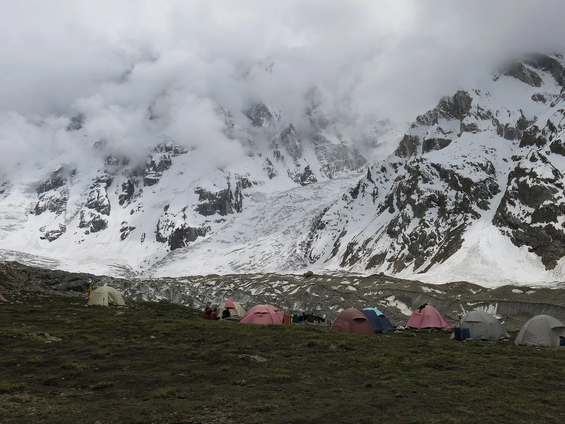 Camping tents pitched below Nanga Parbat near Fairy Meadows