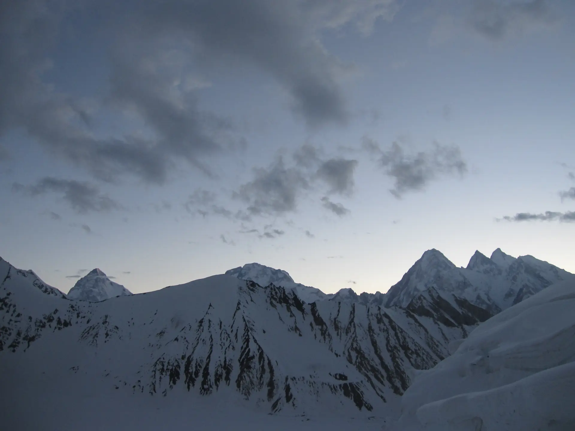 K2, Broad Peak and the Gasherbrums at dawn from the Gondogoro La, next to Gondogoro Peak