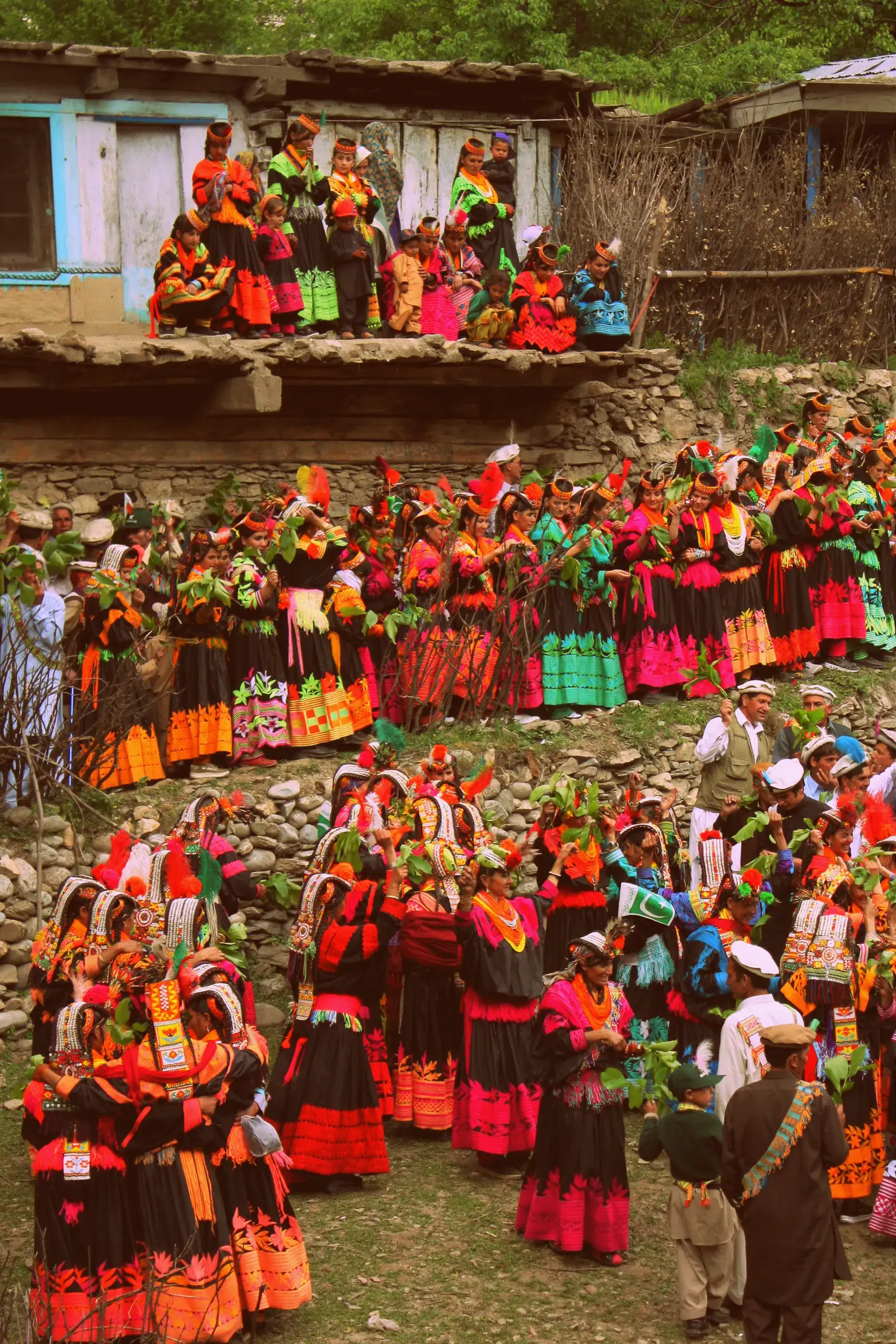 Kalash women dancing in a circle at the Joshi spring festival in Bumburet