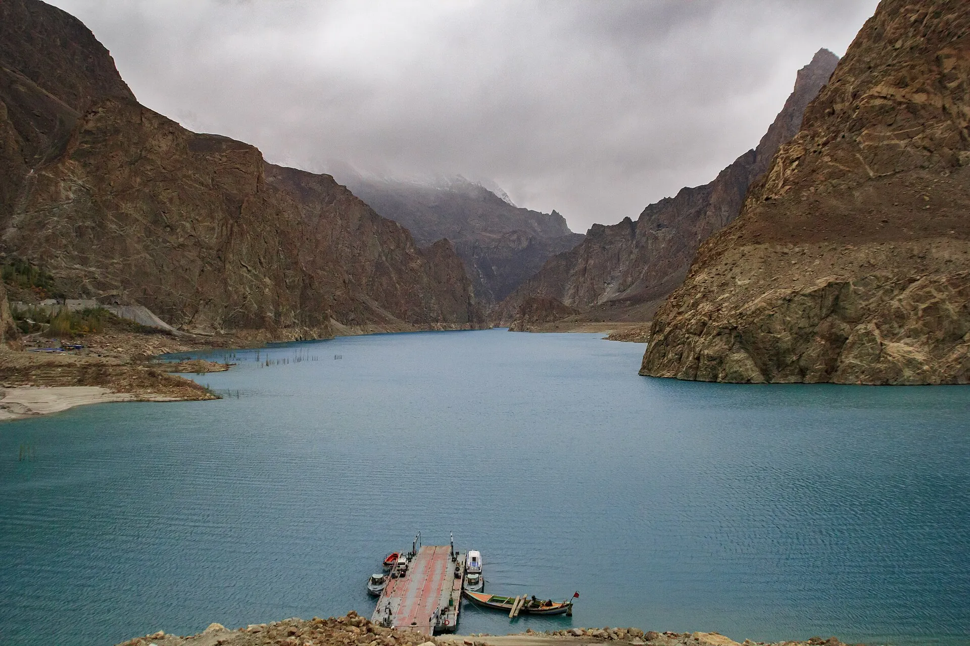 The Karakoram Highway running past turquoise Attabad Lake