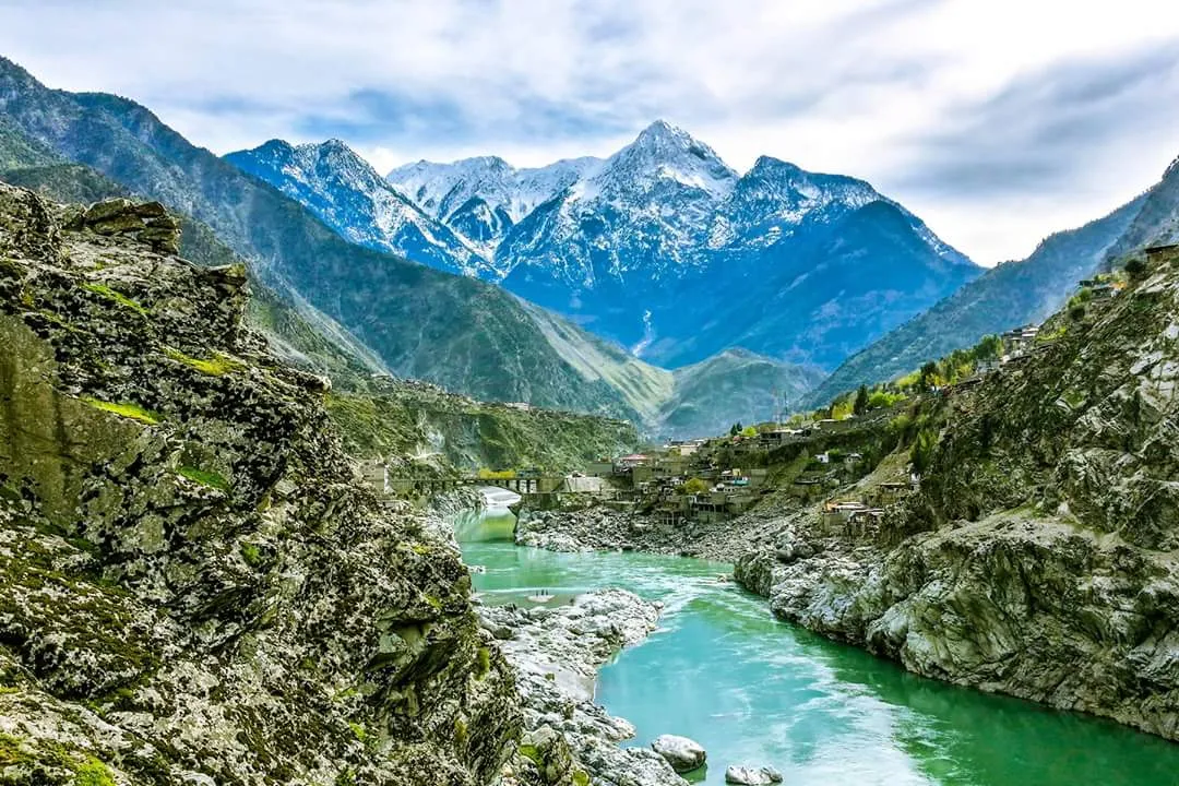 The green Indus River rushing through a gorge beside the Karakoram Highway