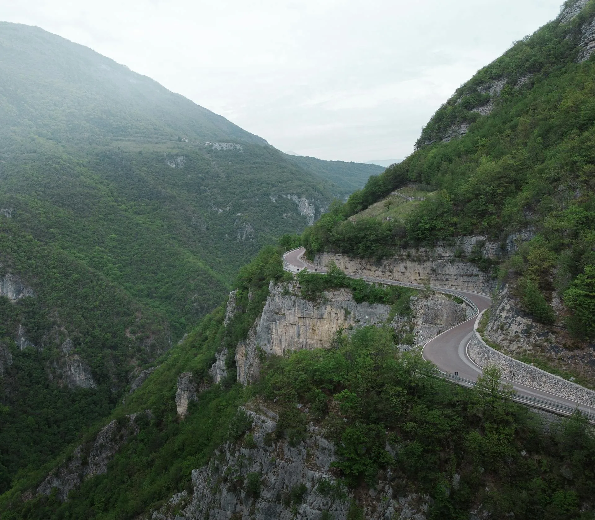 The Karakoram Highway winding along a mountainside in northern Pakistan