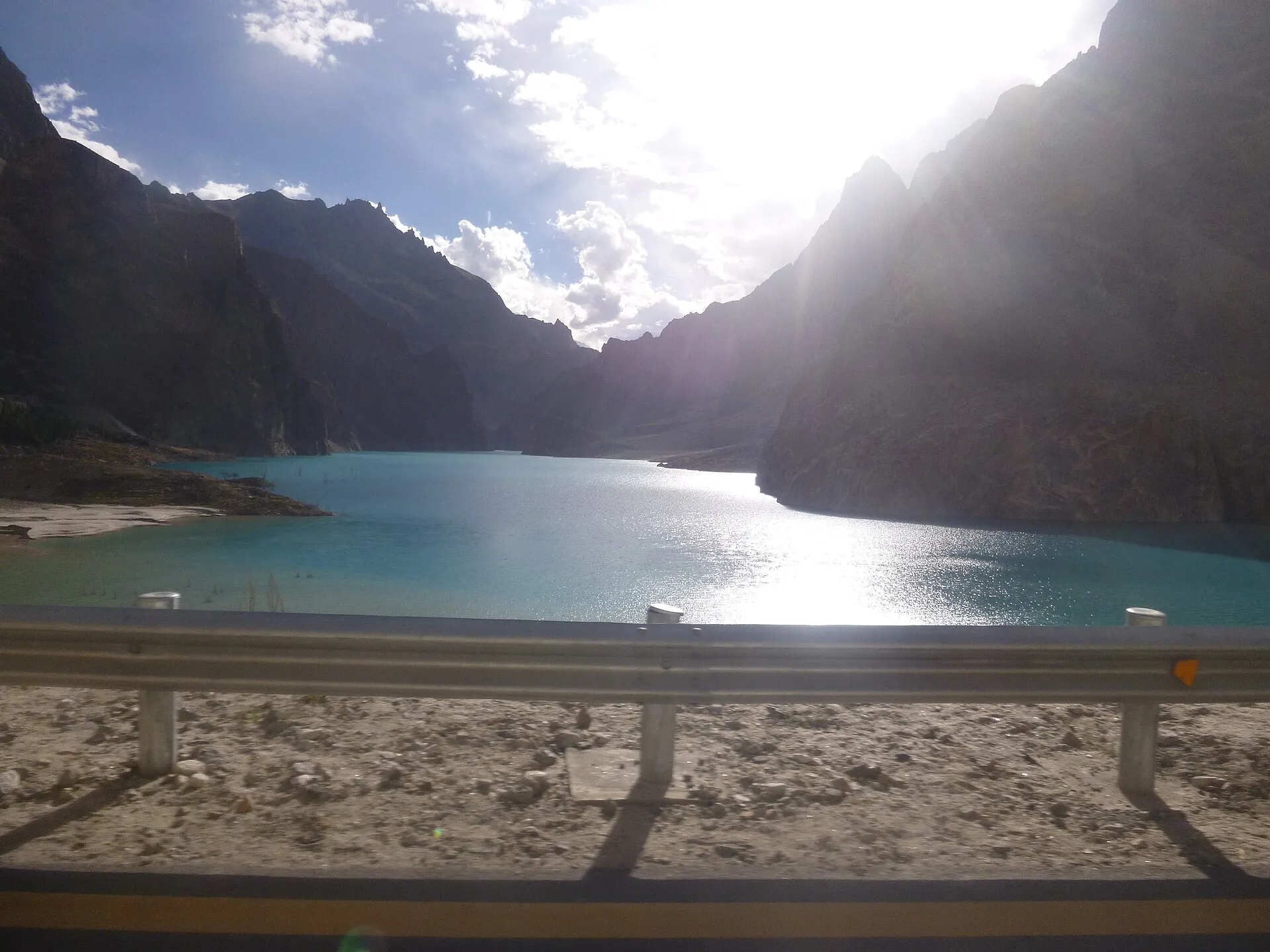 Attabad Lake glinting beside the Karakoram Highway
