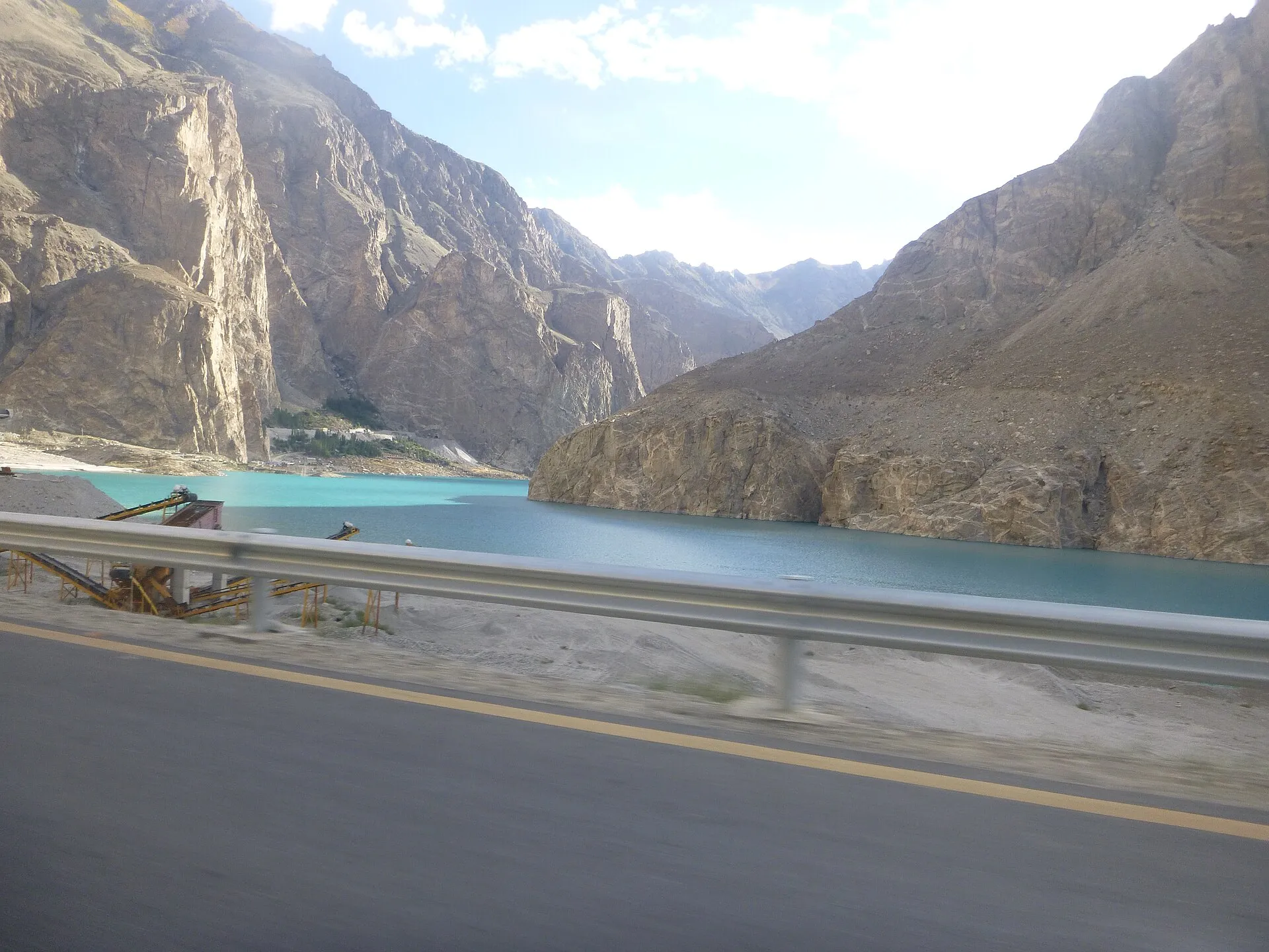 The Karakoram Highway beside turquoise Attabad Lake