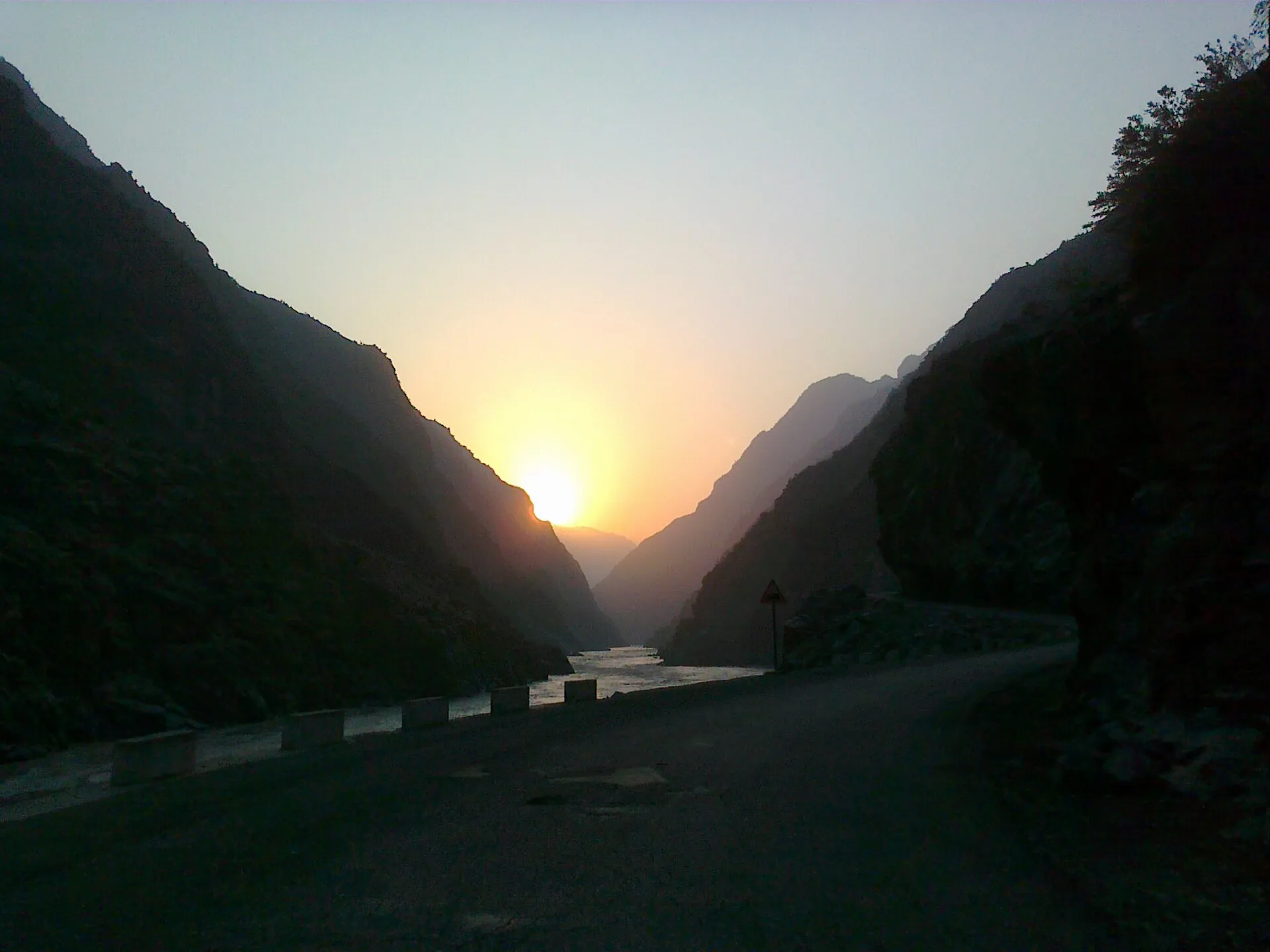 Sunrise over the Karakoram Highway in a mountain gorge
