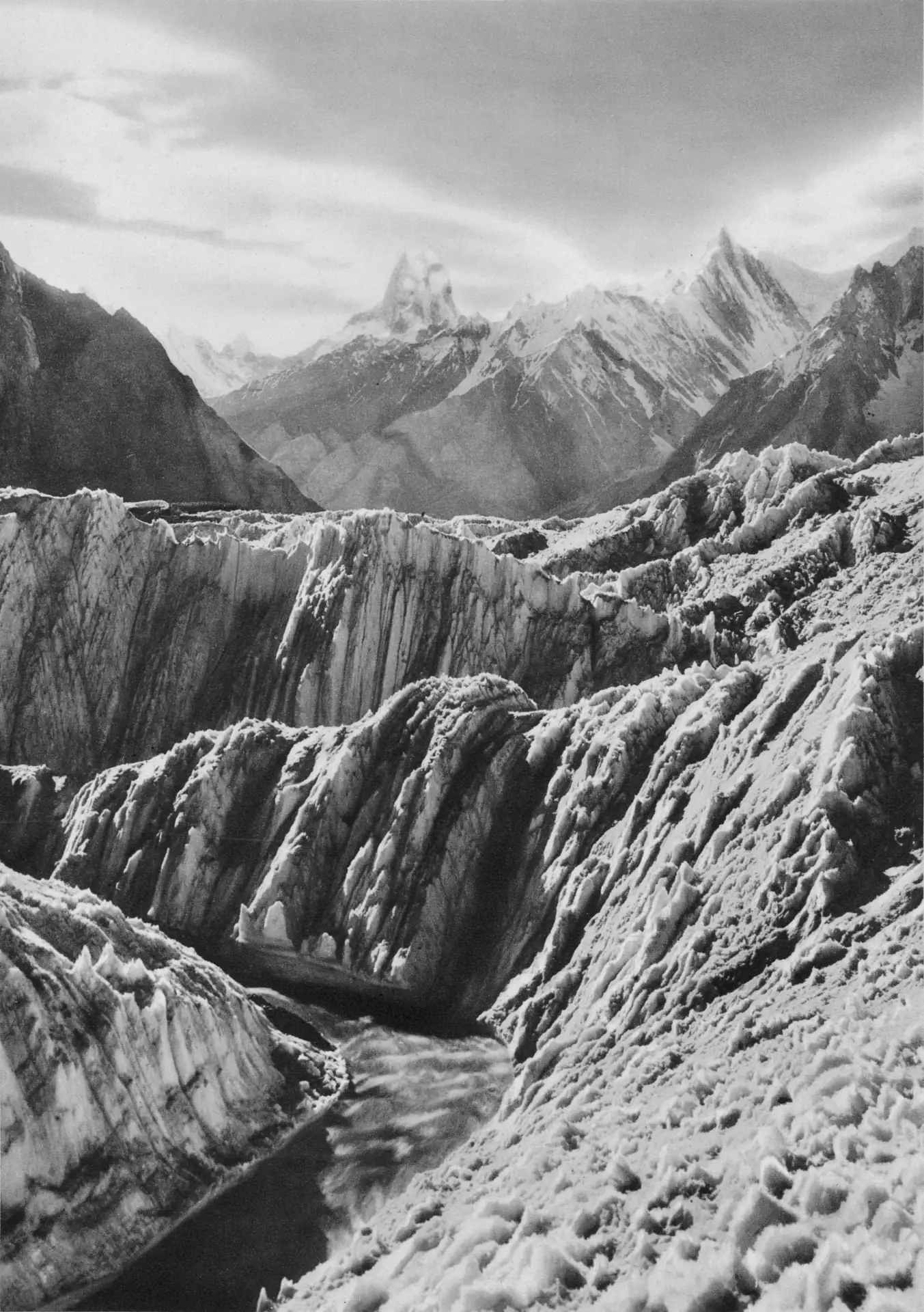 Ice seracs on the Baltoro glacier with Muztagh Tower in the distance, Vittorio Sella, 1909