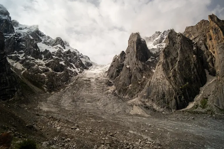 Glacier and moraine in the upper Nangma Valley between granite walls