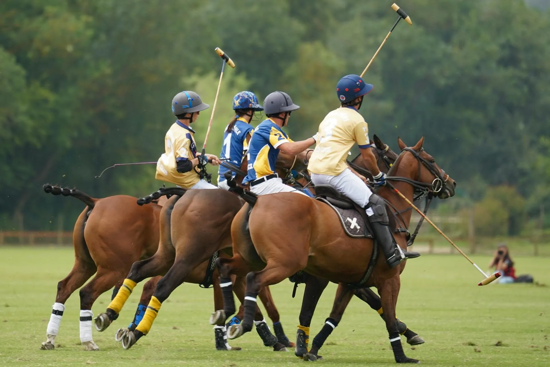 Men riding horses