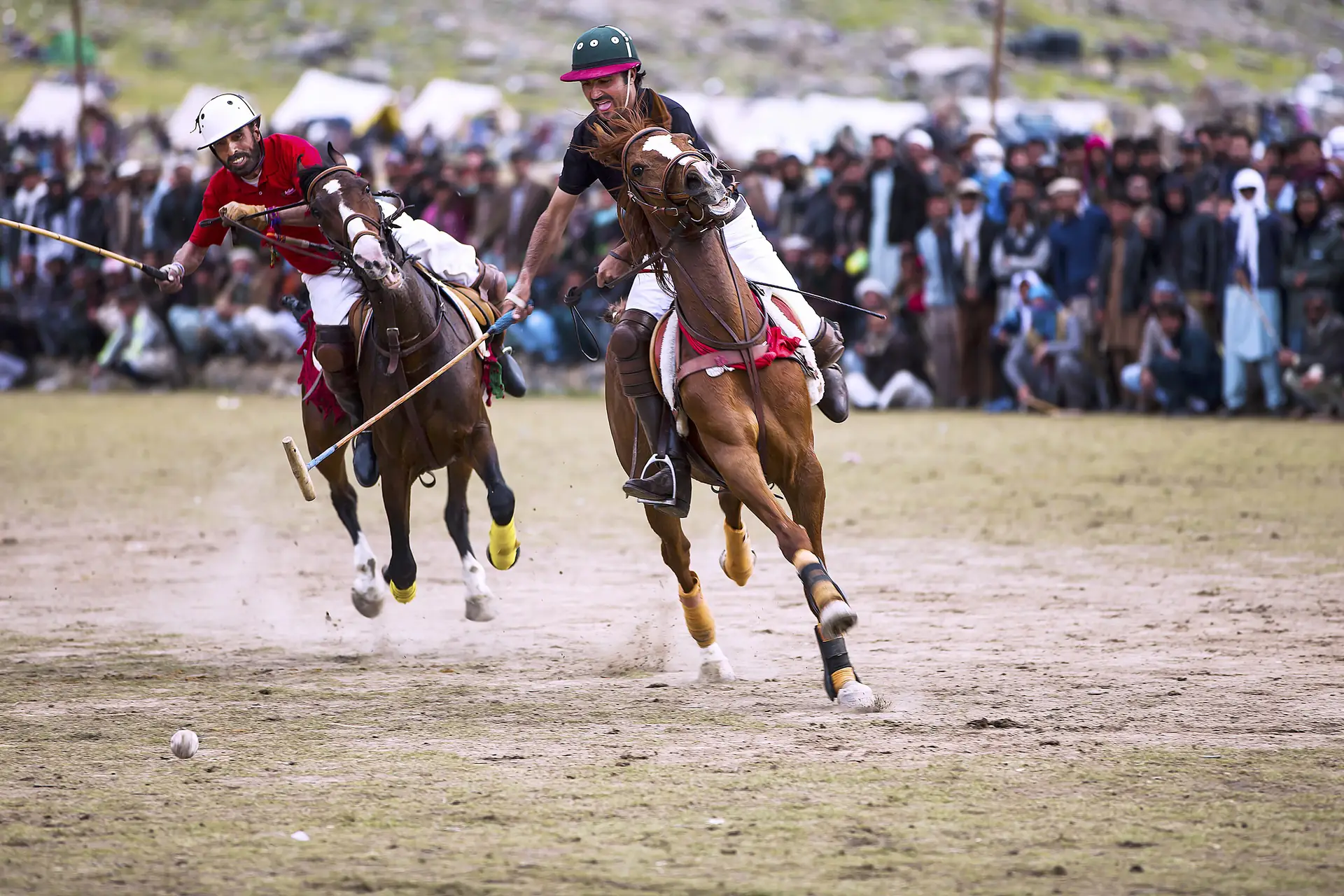 Polo player galloping across the Shandur ground