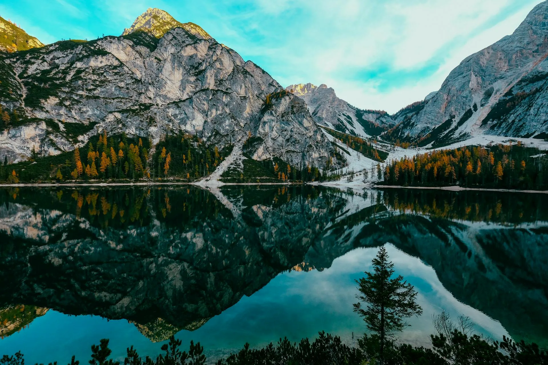 Mountain reflection on calm lake waters