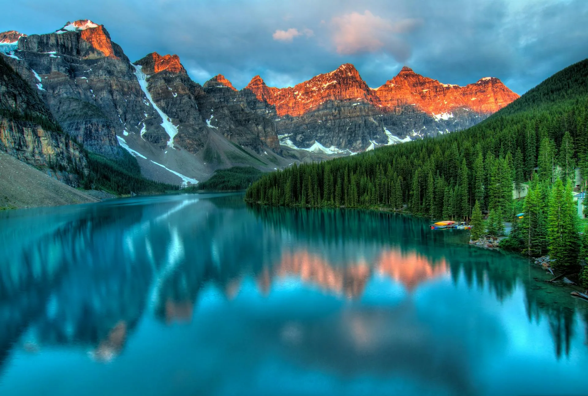 Serene mountain lake with peak reflections