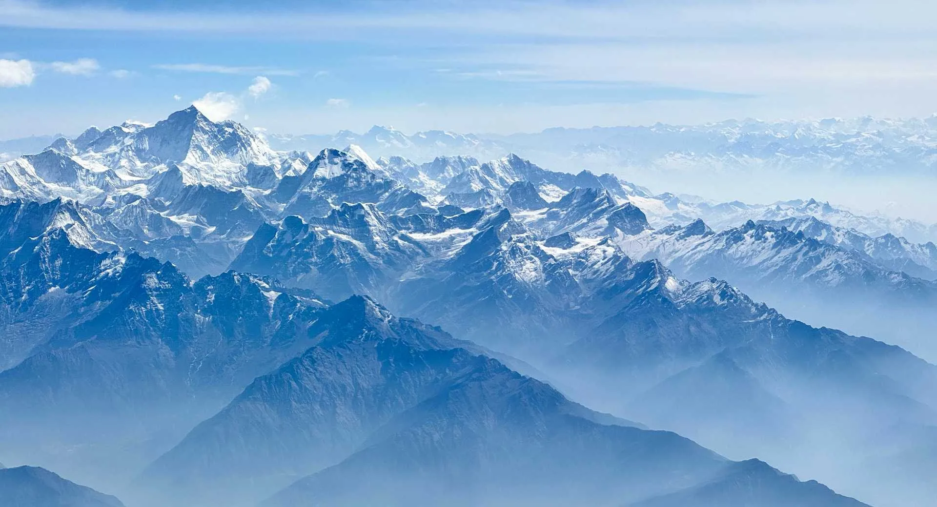 Aerial view of Broad Peak and Karakoram range with misty valleys Gilgit-Baltistan Pakistan