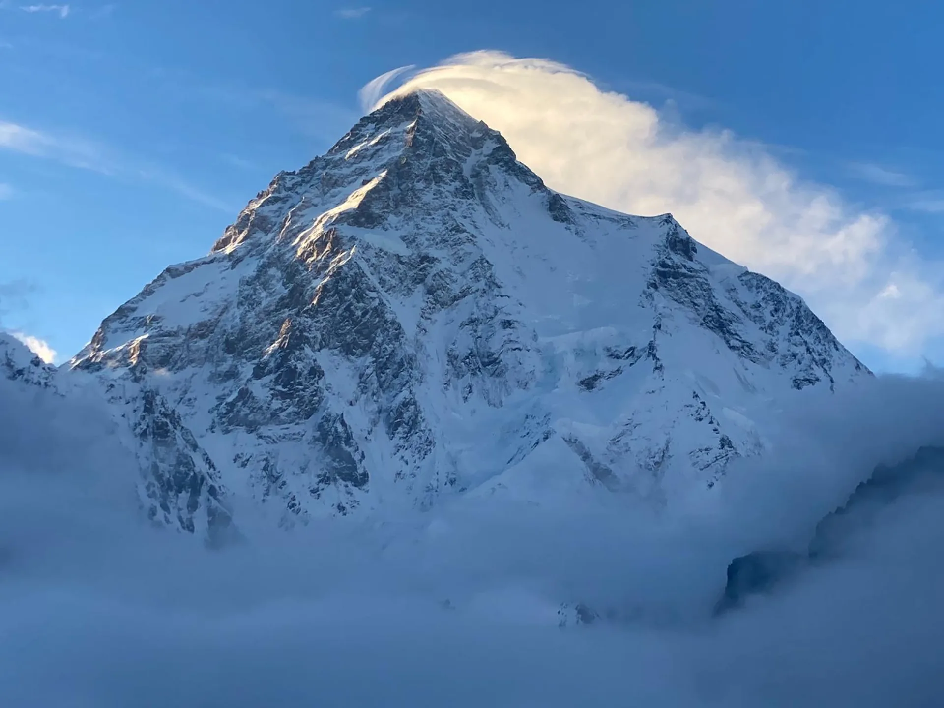 K2 8611m Broad Peak mighty neighbour rising through clouds Karakoram Pakistan