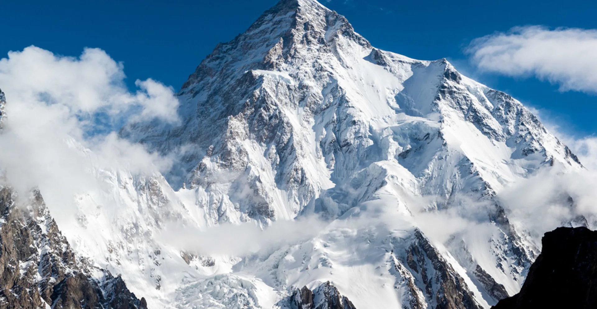 Broad Peak massive north face covered in snow and ice Karakoram range Pakistan