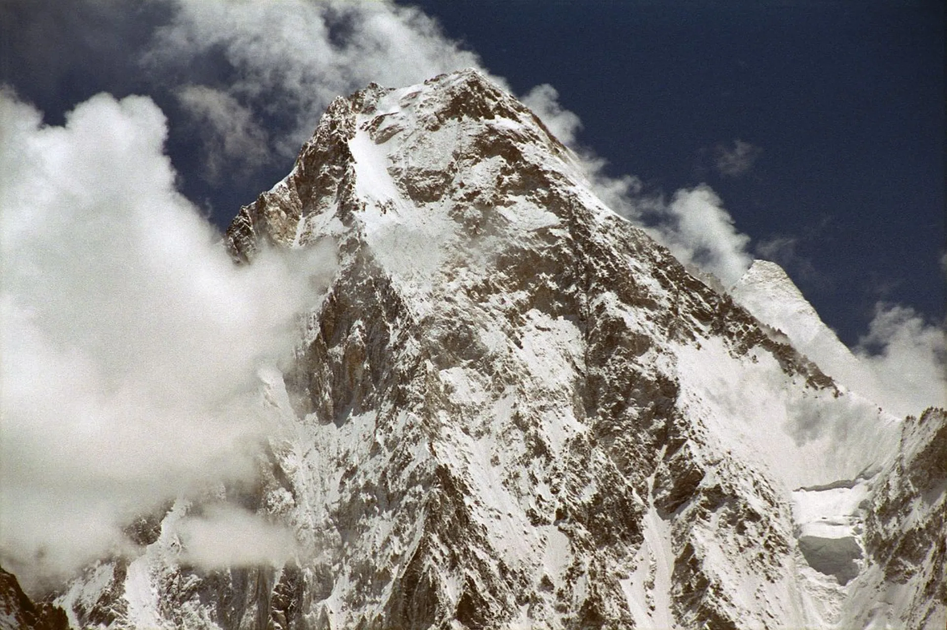 Gasherbrum IV rocky summit with Gasherbrum II behind viewed from Concordia, Baltoro Glacier Pakistan